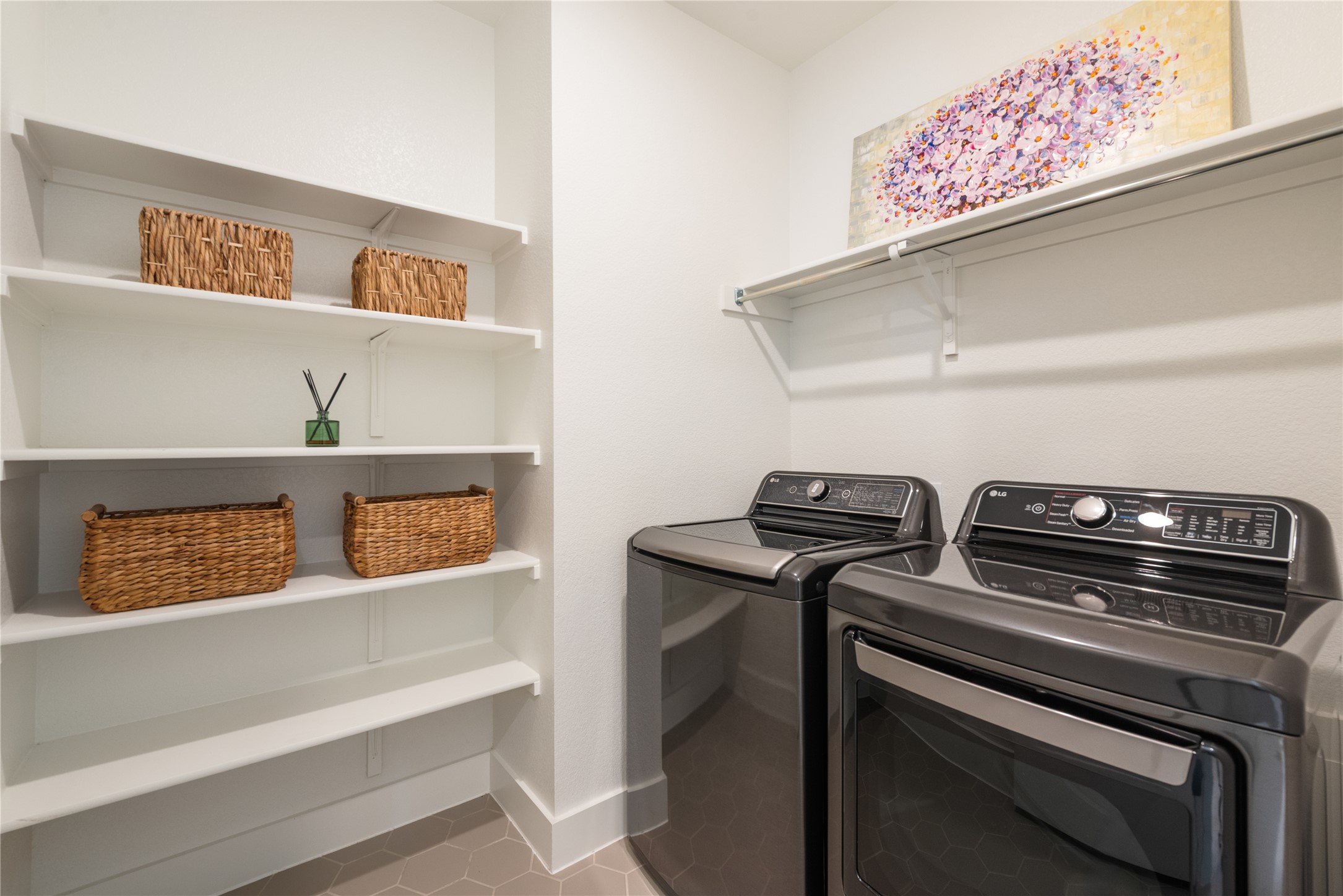 294 Kimble Creek Loop Kyle, TX 78640 - Photo 20 of 40 Spacious laundry room features ample shelving for organization. Waher/dryer convey.