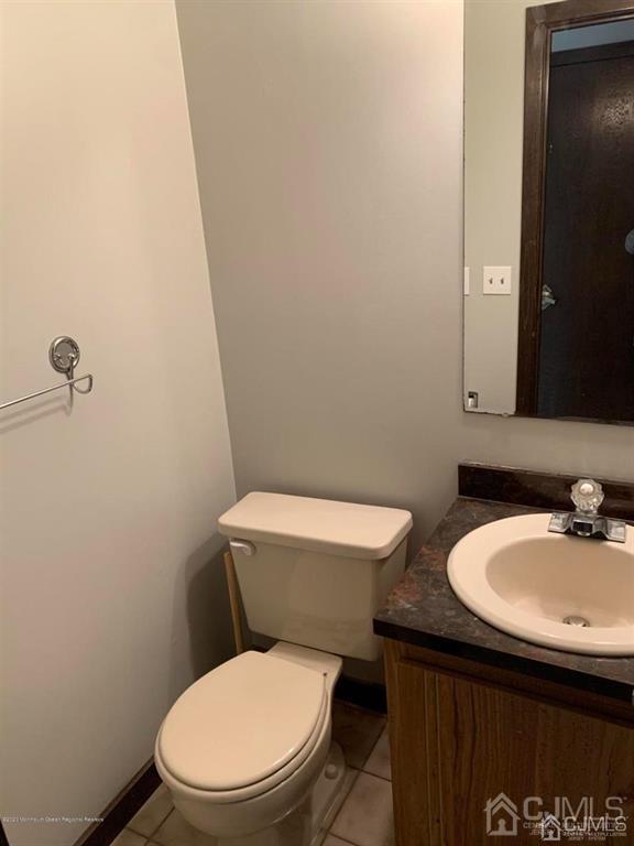 24 Pendleton Place Old Bridge, NJ 08857 - Photo 9 of 22 a white toilet sitting next to a bathroom sink