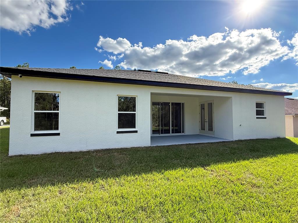 7815 Southwest 128th St Road Ocala, FL 34473 - Photo 36 of 40 a view of a house with a garden