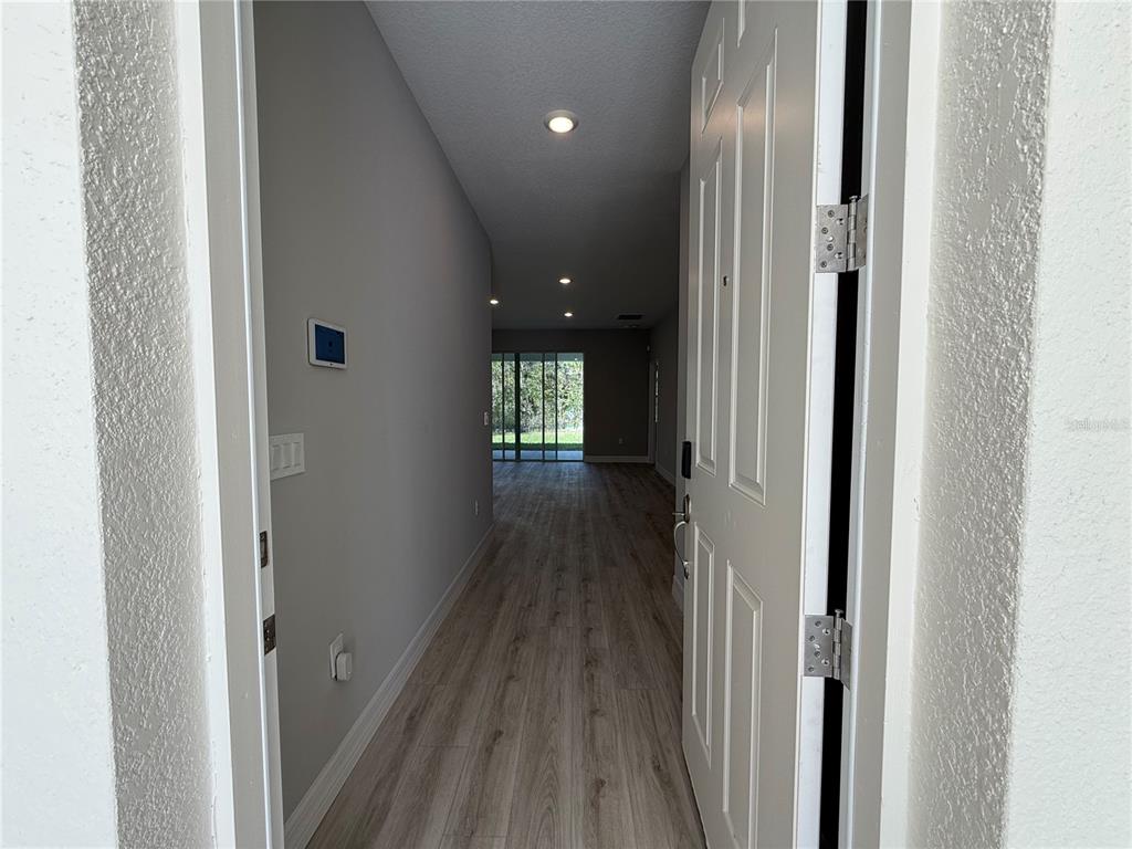 7815 Southwest 128th St Road Ocala, FL 34473 - Photo 6 of 40 a view of gallery with wooden floor