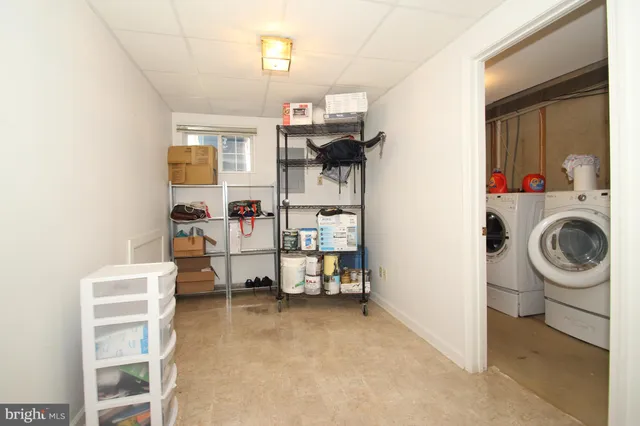 a view of living room washer and dryer