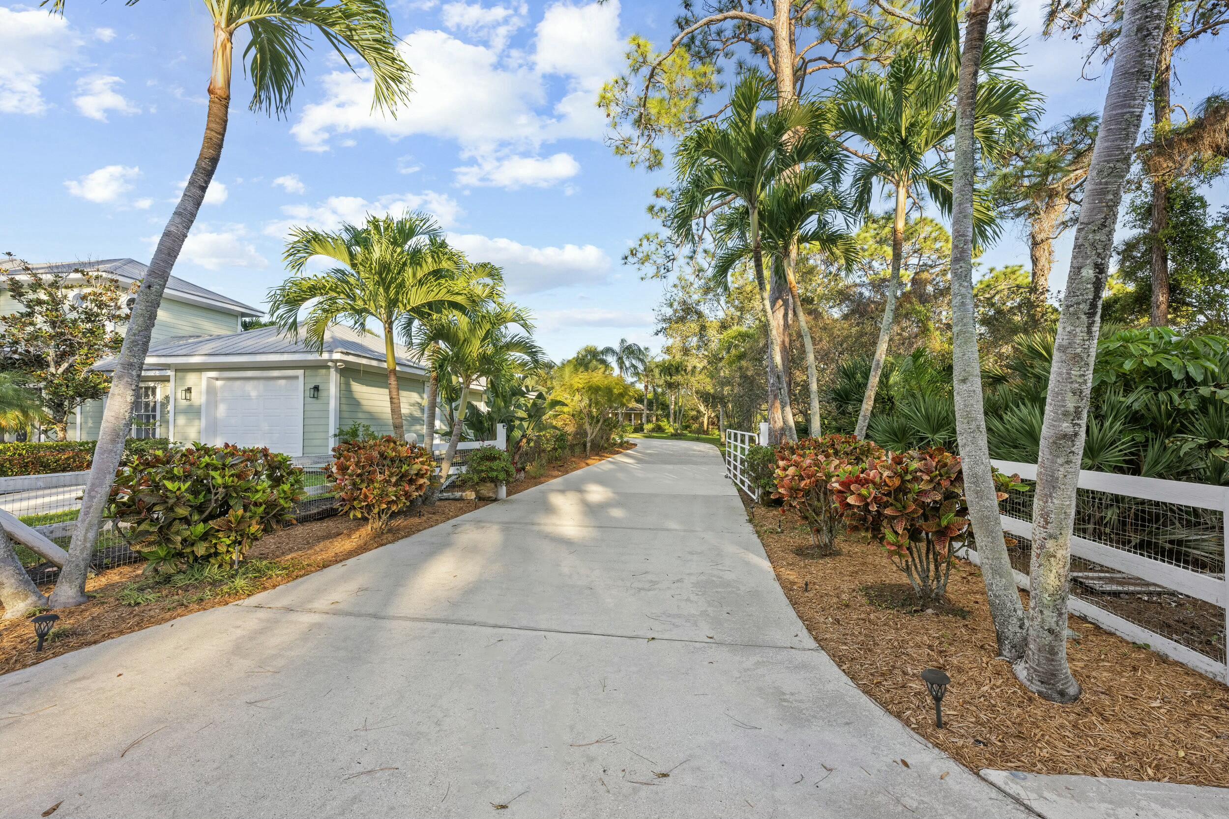 19077 Southeast County Line Road Jupiter, FL 33469 - Photo 62 of 74 Gated Driveway