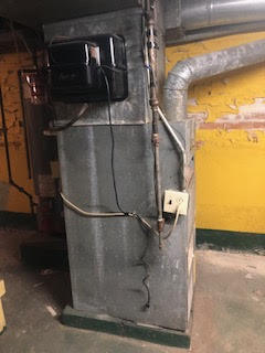 3343 West 64th Place Chicago, IL 60629 - Photo 19 of 22 a water heater on the wall