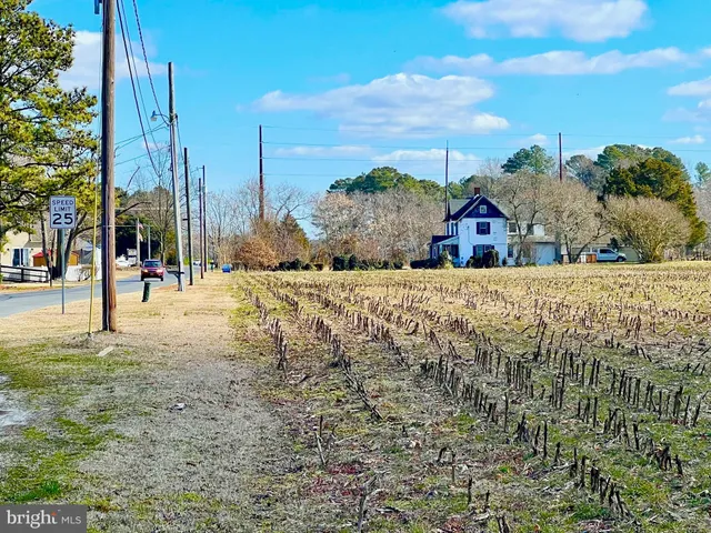 a view of road with a building
