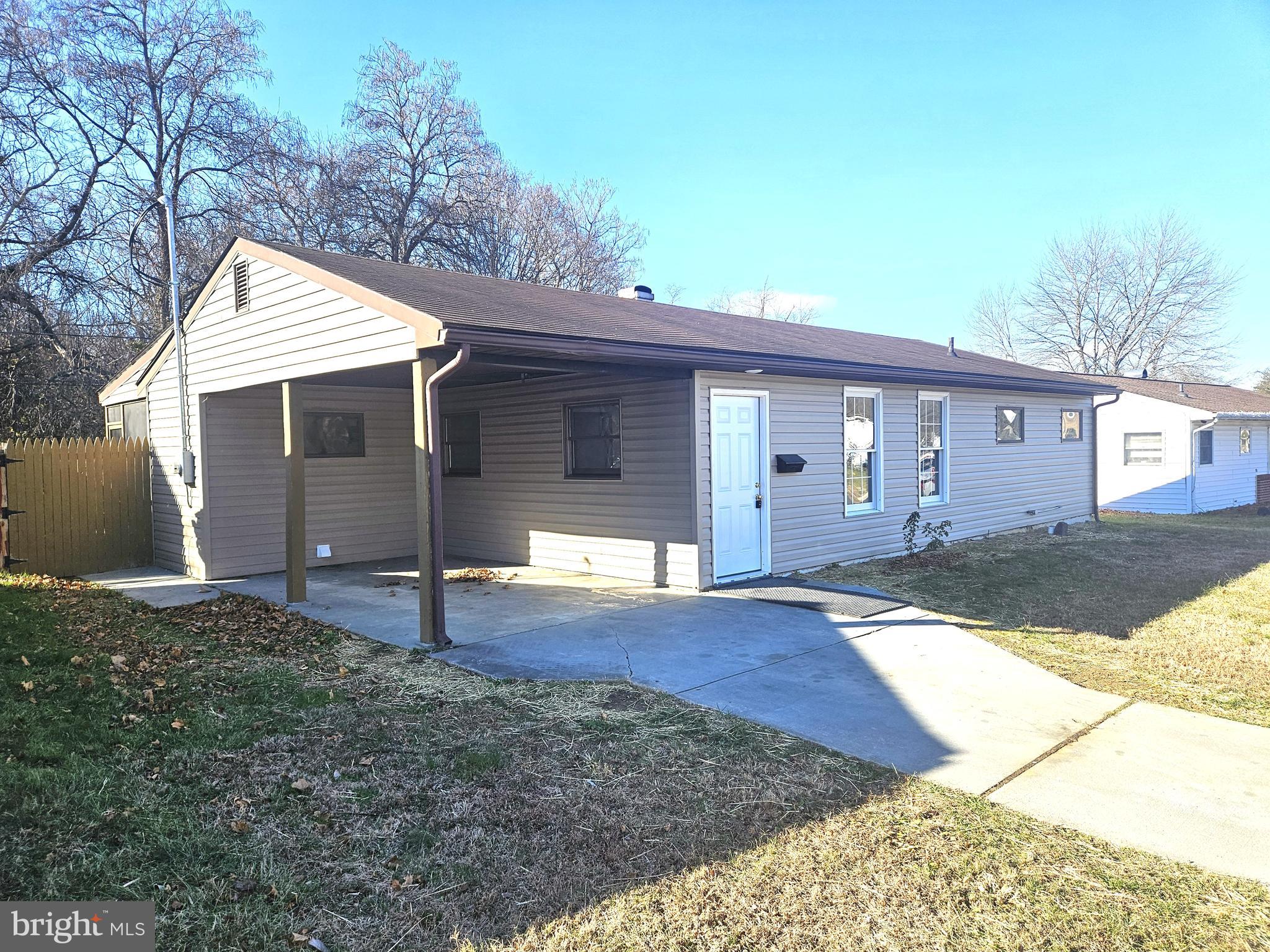 20 Kent Road Elkton, MD 21921 - Photo 2 of 20 a backyard of a house with table and chairs