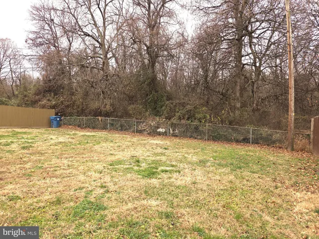 a view of a swimming pool with an outdoor space
