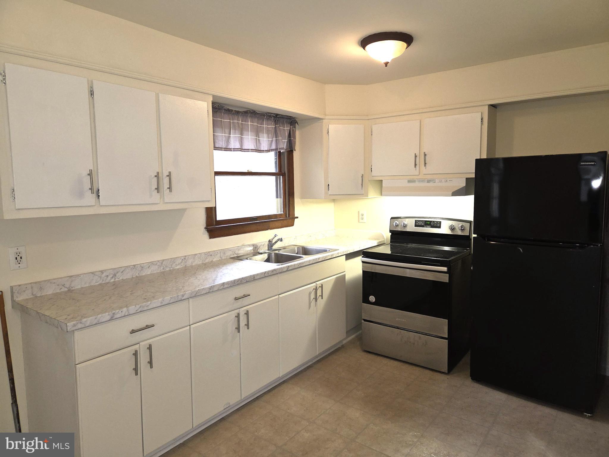 20 Kent Road Elkton, MD 21921 - Photo 8 of 20 a kitchen with a sink appliances and cabinets