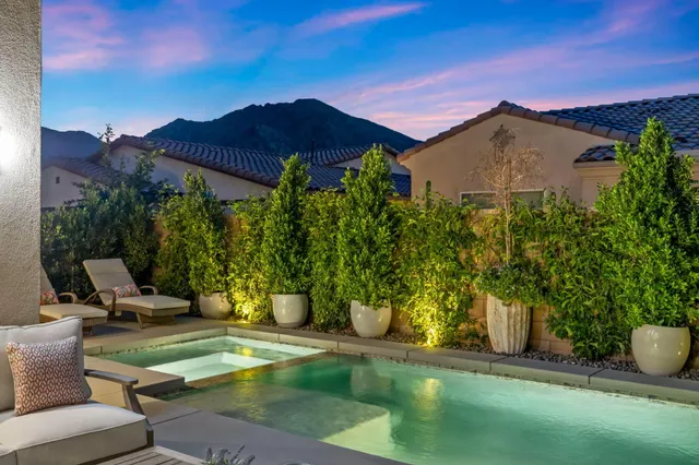 a view of a backyard with a patio