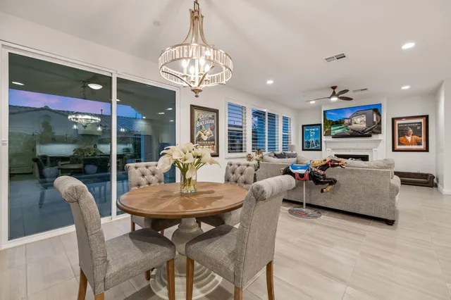 a bedroom with a bed and lamp