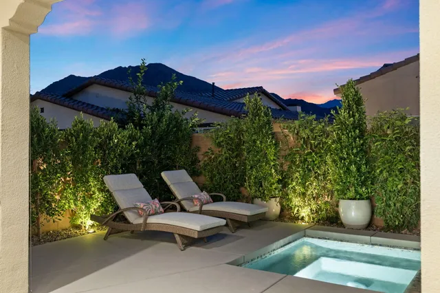 a view of a patio with a yard