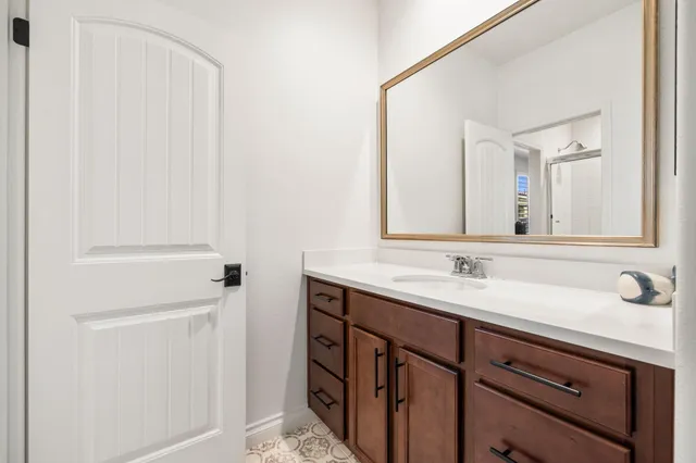 a brick building with a small yard