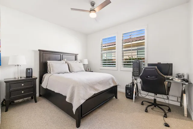 an aerial view of residential house and green space