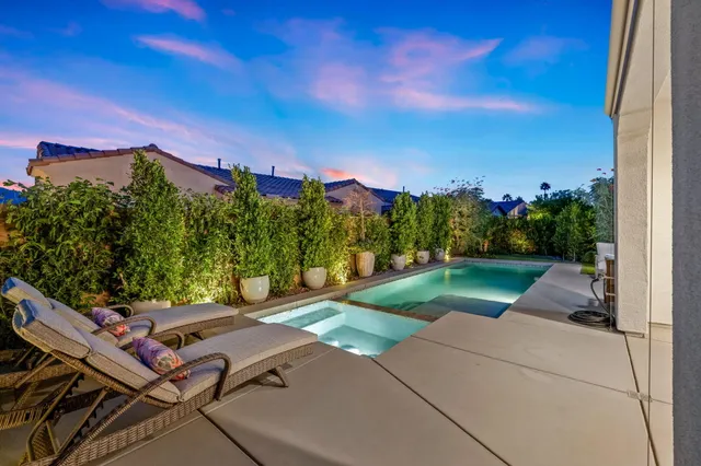 a view of multiple houses with a city street