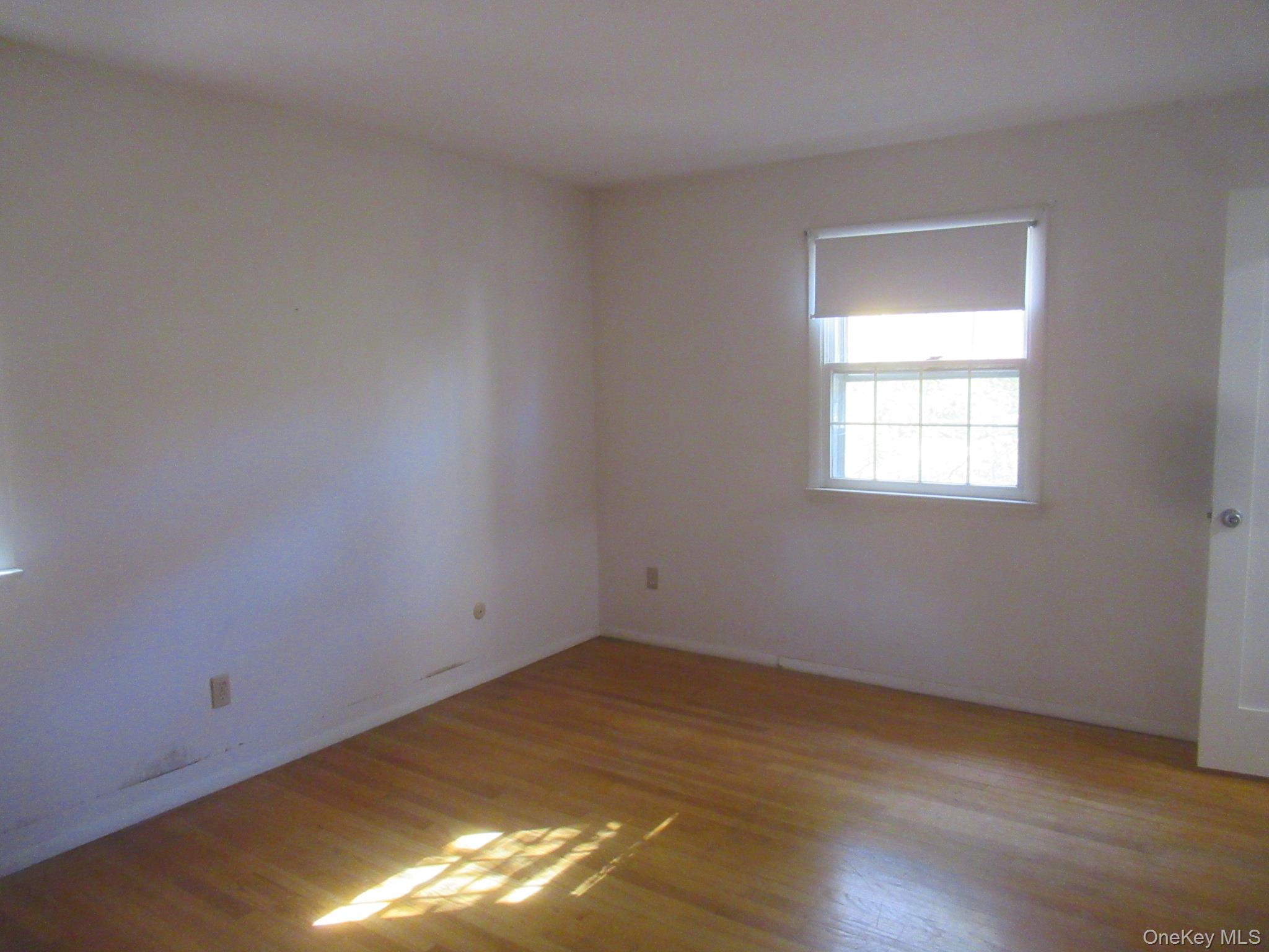 77 Brothers Road Wappingers Falls, NY 12590 - Photo 12 of 21 an empty room with a window