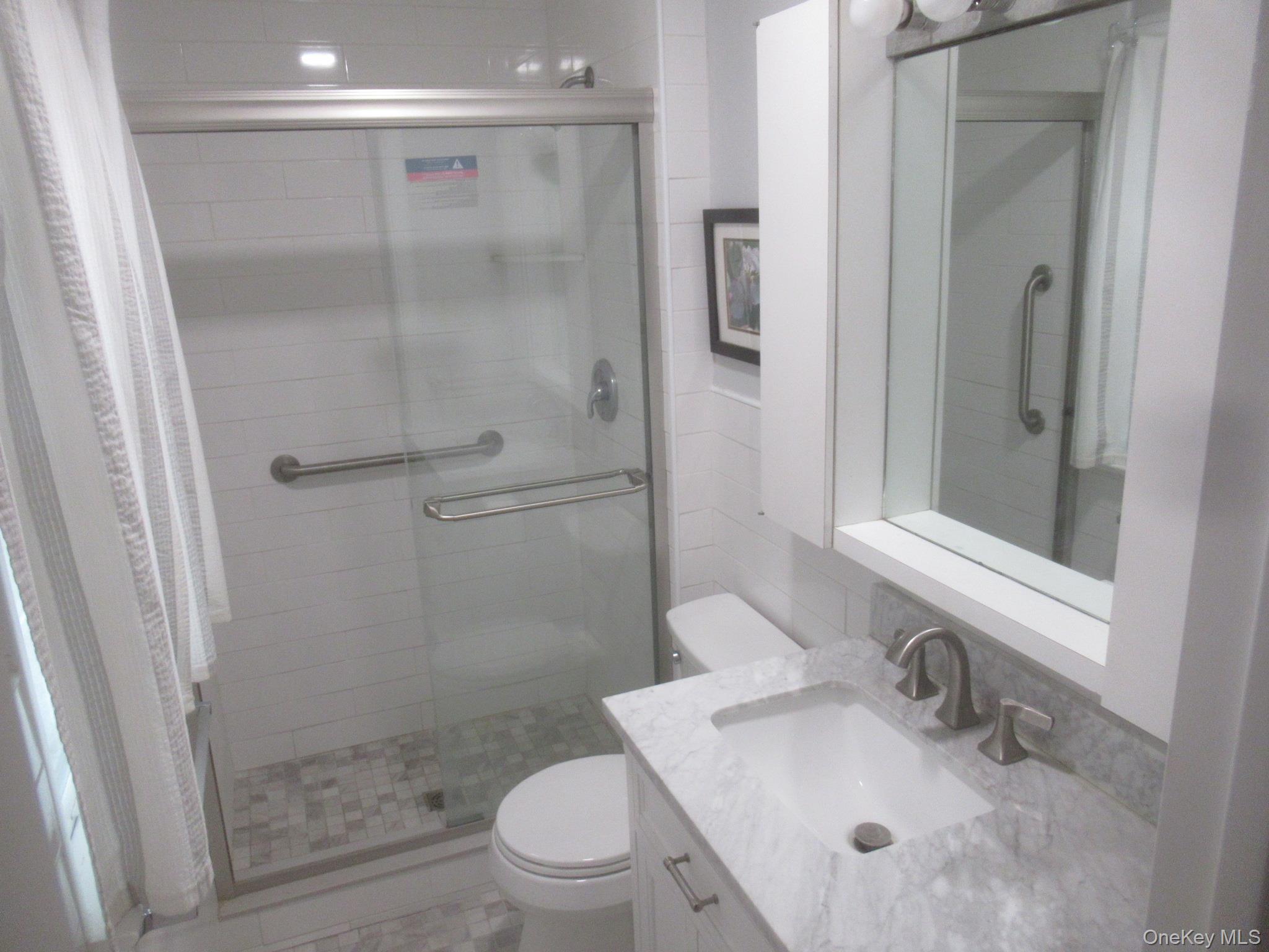 77 Brothers Road Wappingers Falls, NY 12590 - Photo 14 of 21 a bathroom with a sink toilet and shower