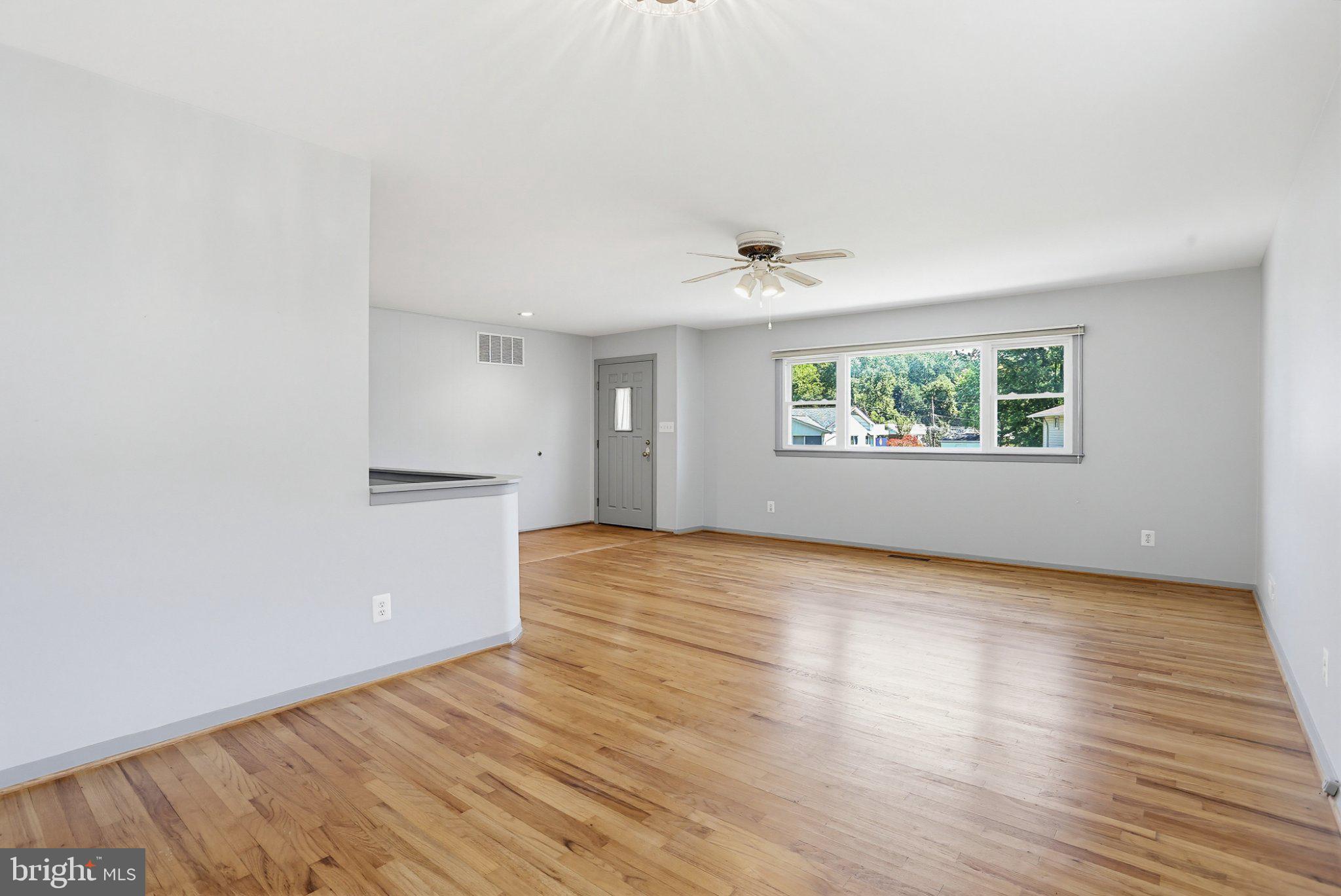 8145 Scotts Level Road Pikesville, MD 21208 - Photo 6 of 45 Bright and airy open space awaits.