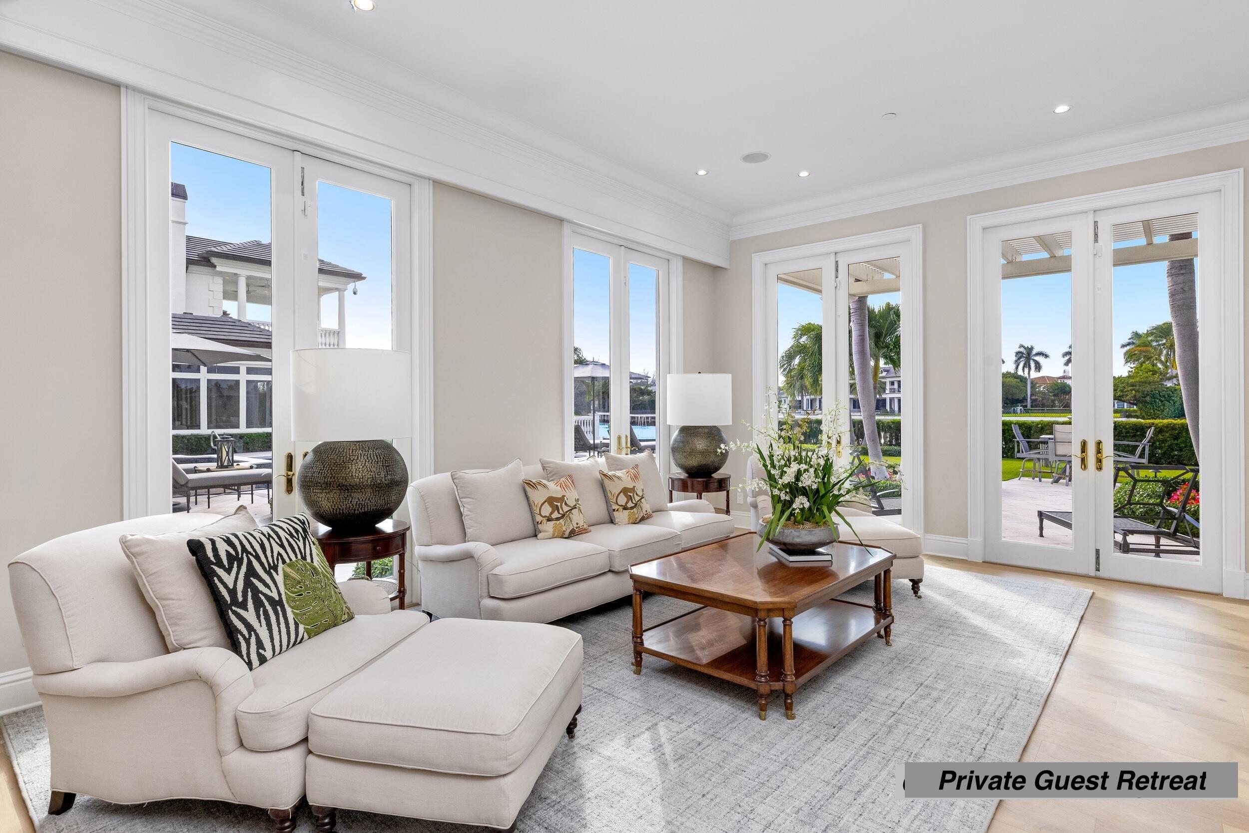 2989 Spanish River Road Boca Raton, FL 33432 - Photo 105 of 130 a living room with furniture and a large window