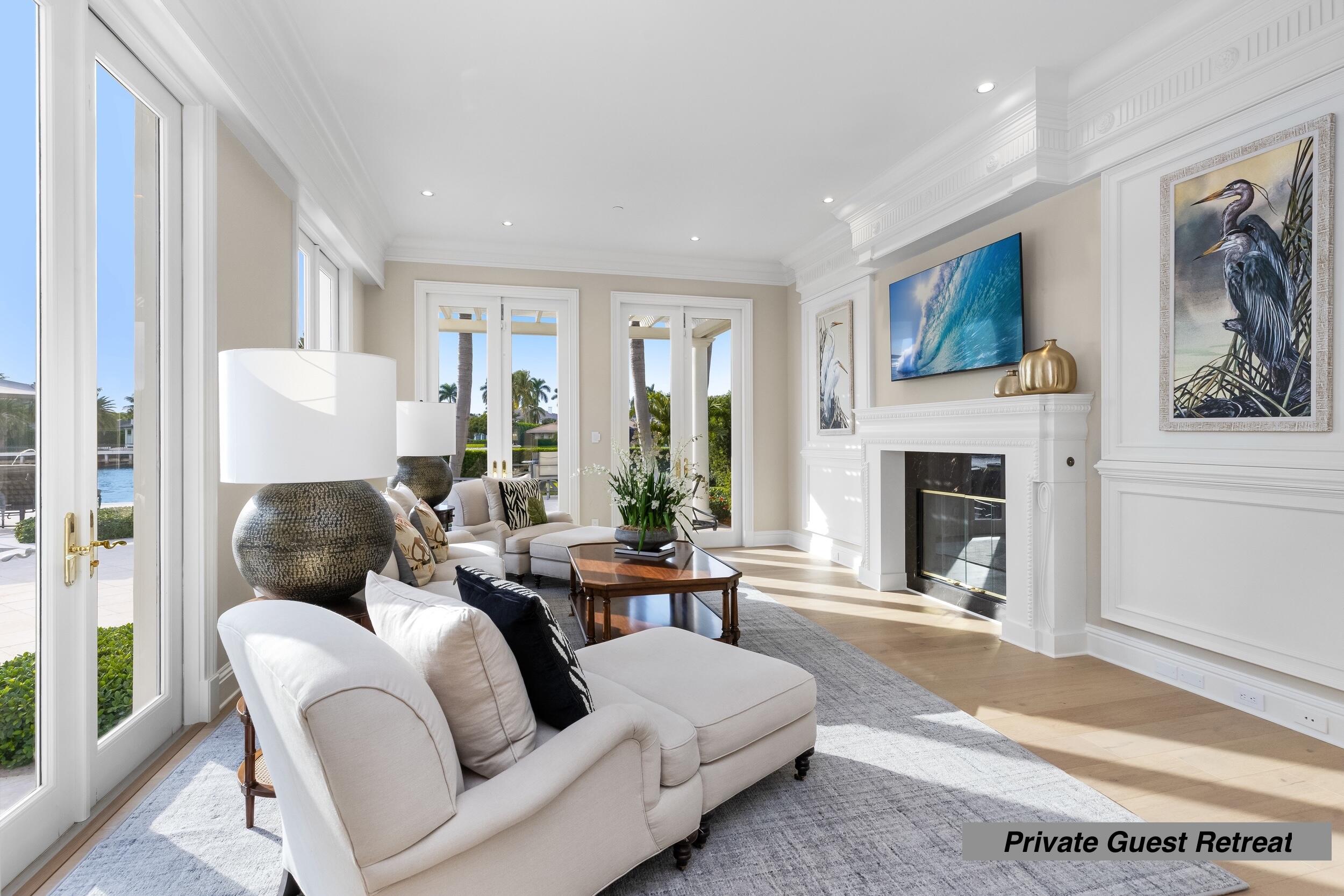 2989 Spanish River Road Boca Raton, FL 33432 - Photo 106 of 130 a living room with furniture and a fireplace