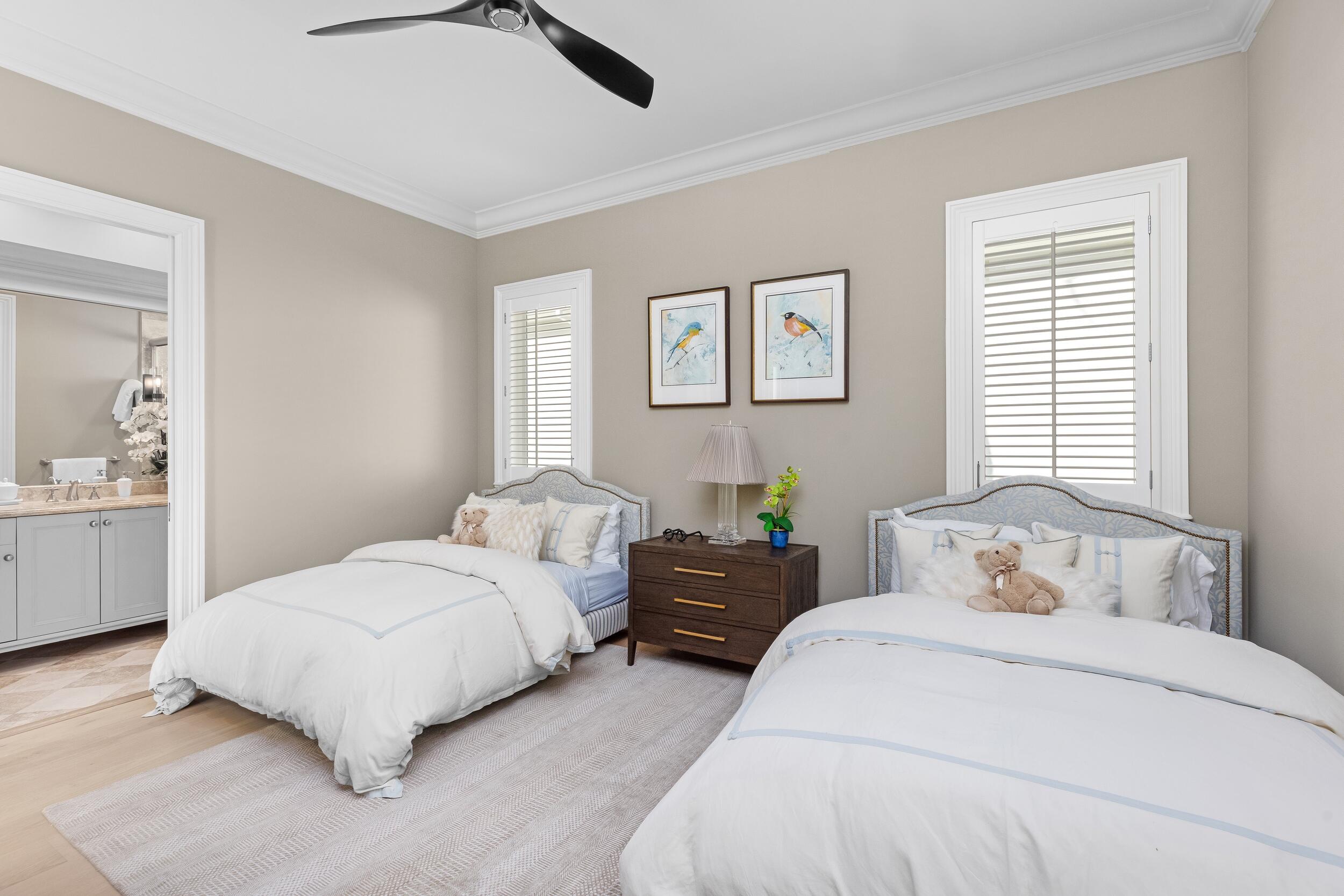 2989 Spanish River Road Boca Raton, FL 33432 - Photo 110 of 130 a bedroom with two beds and white walls