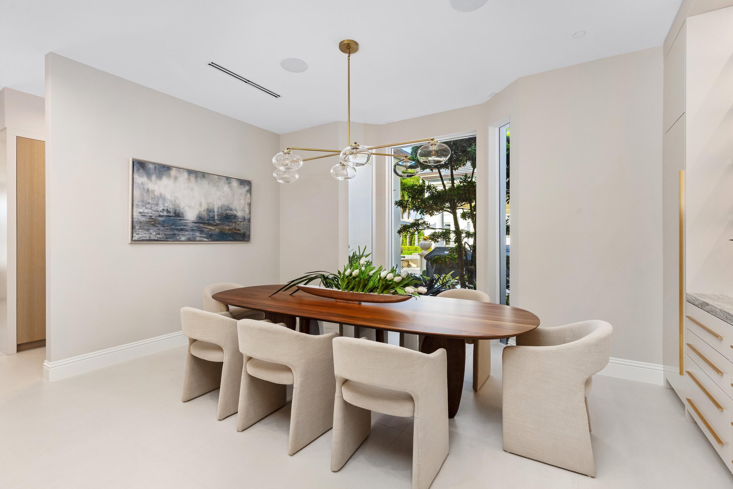 2989 Spanish River Road Boca Raton, FL 33432 - Photo 26 of 130 a view of a dining room with furniture and window