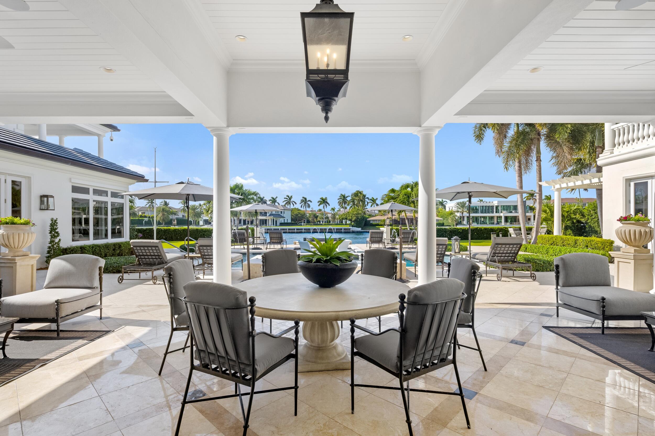 2989 Spanish River Road Boca Raton, FL 33432 - Photo 38 of 130 a view of a dining room with furniture window and outside view