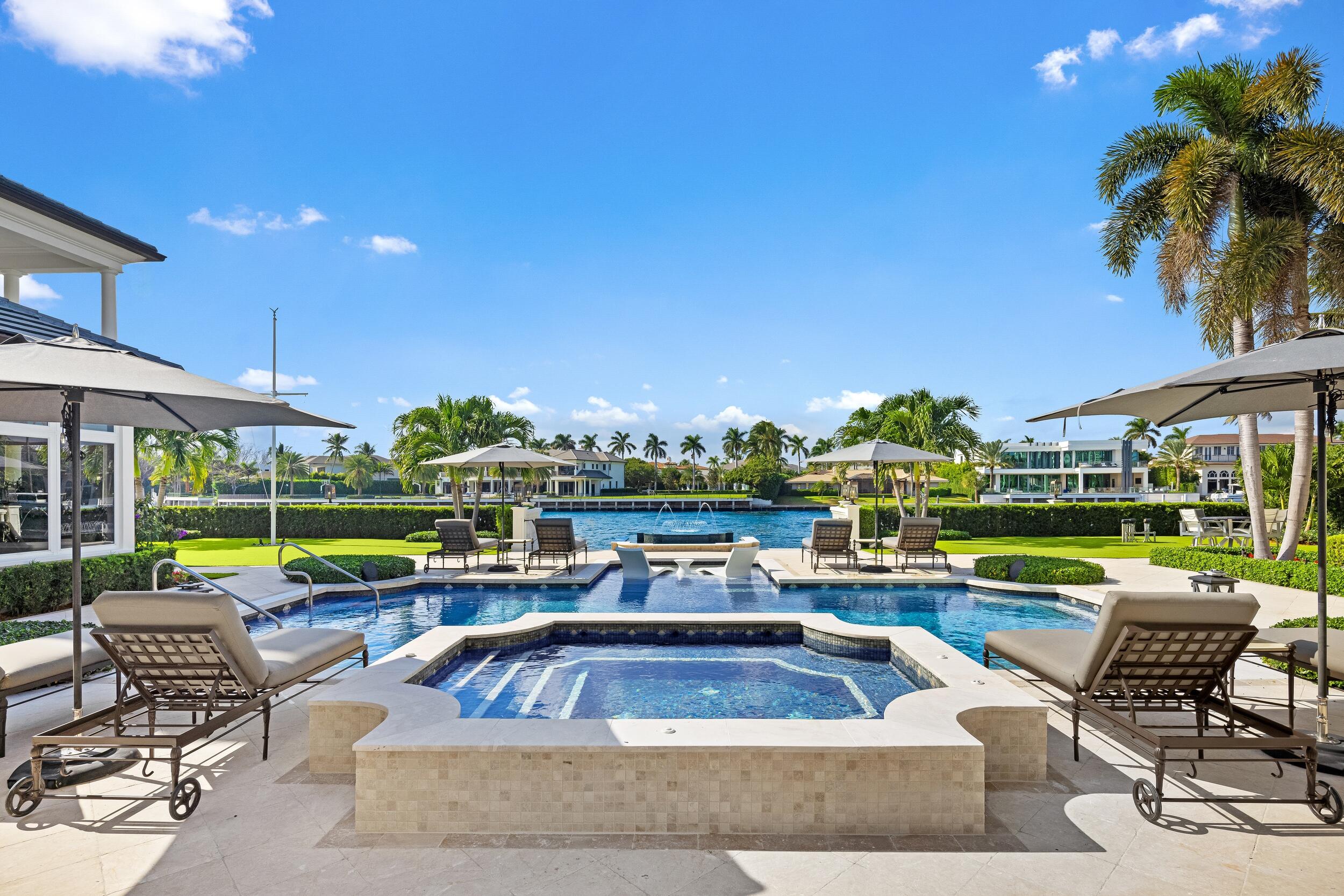 2989 Spanish River Road Boca Raton, FL 33432 - Photo 43 of 130 a view of swimming pool with outdoor seating and a patio