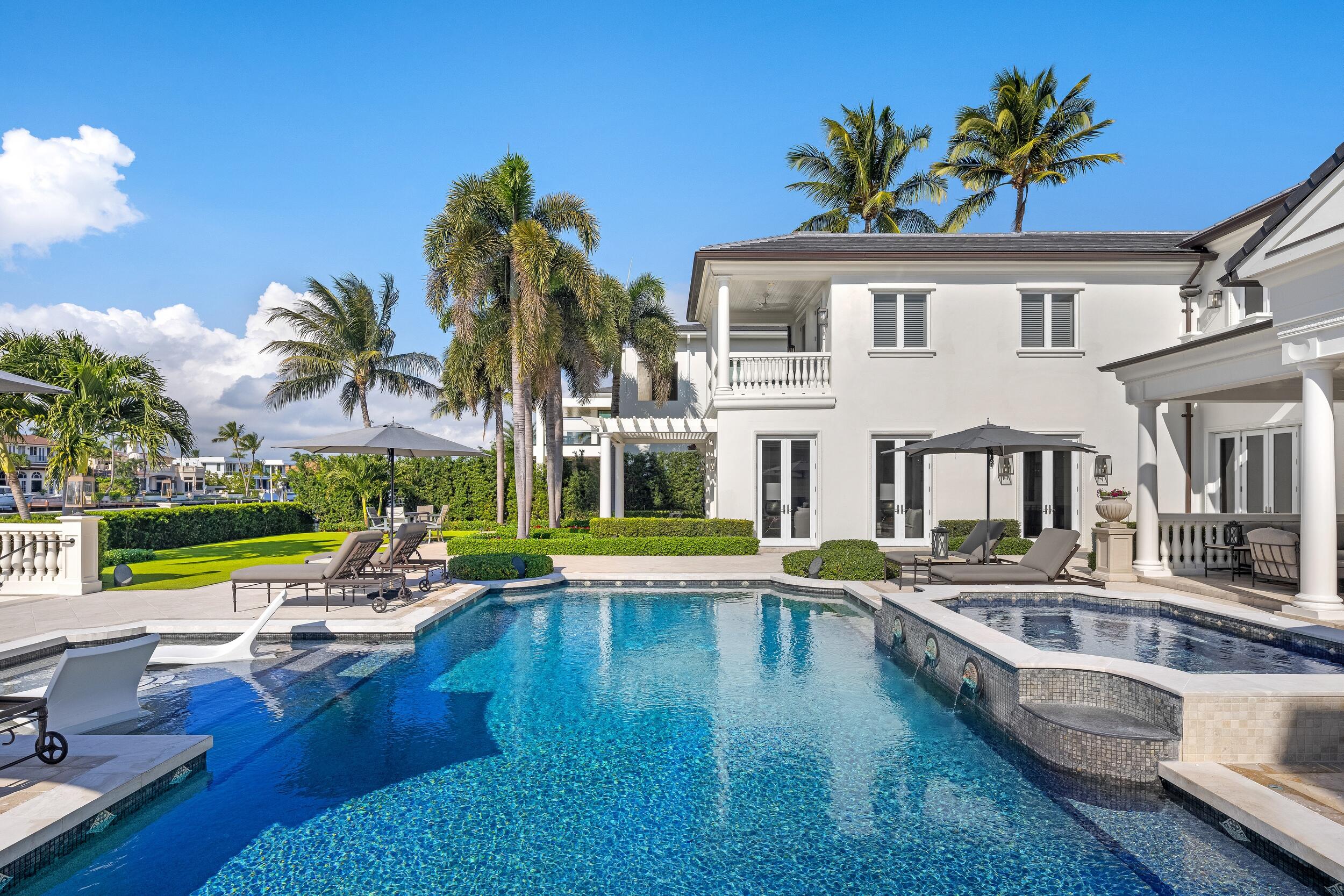 2989 Spanish River Road Boca Raton, FL 33432 - Photo 51 of 130 a view of a patio with swimming pool table and chairs