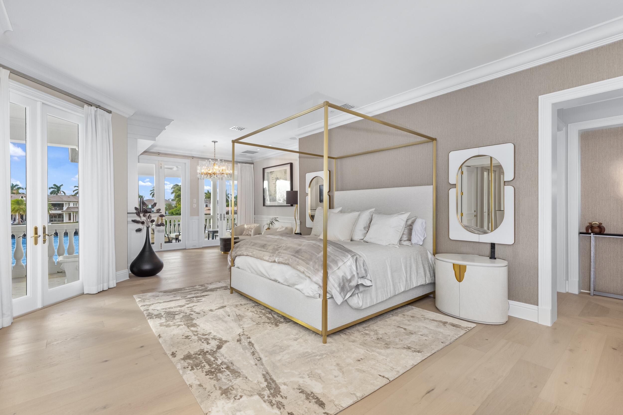 2989 Spanish River Road Boca Raton, FL 33432 - Photo 79 of 130 a bedroom with a white bed and white walls