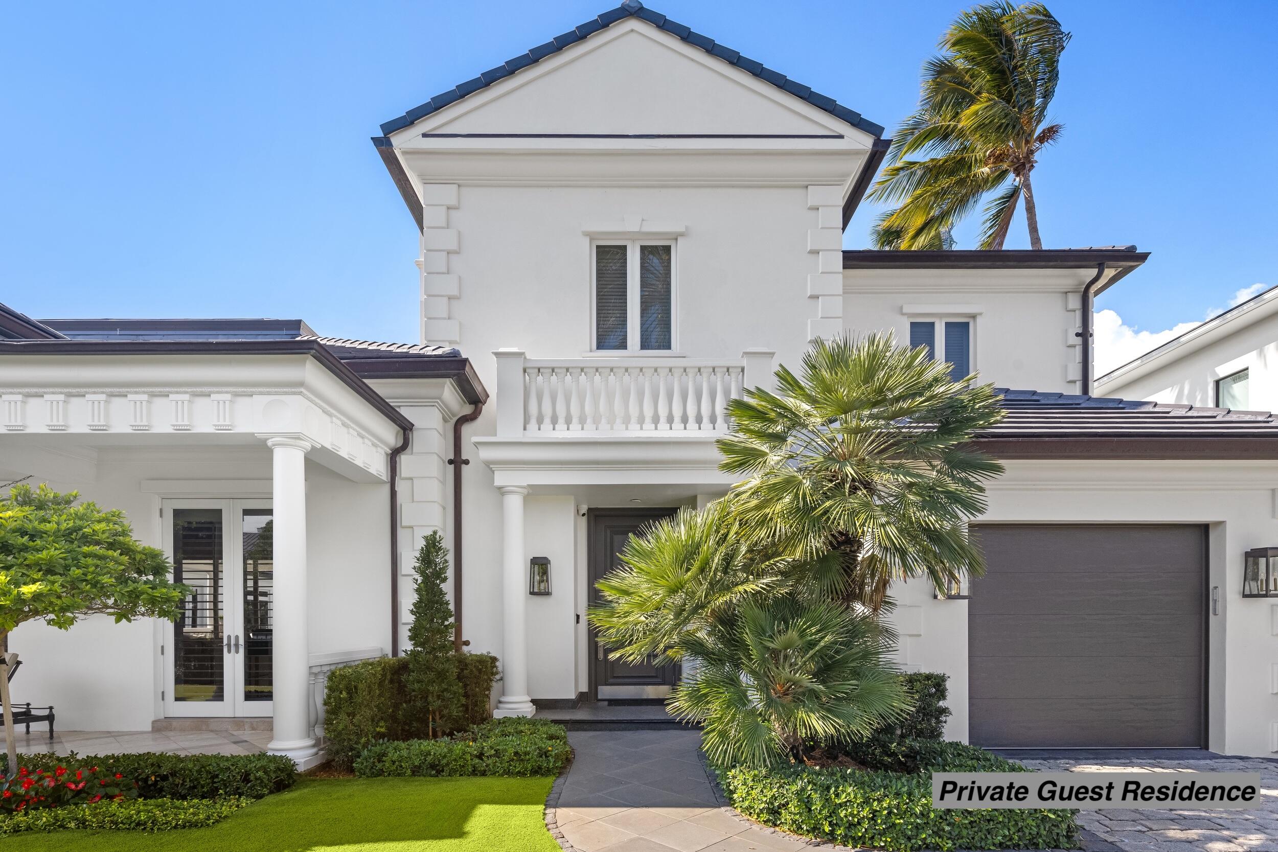 2989 Spanish River Road Boca Raton, FL 33432 - Photo 97 of 130 a front view of a house with garden