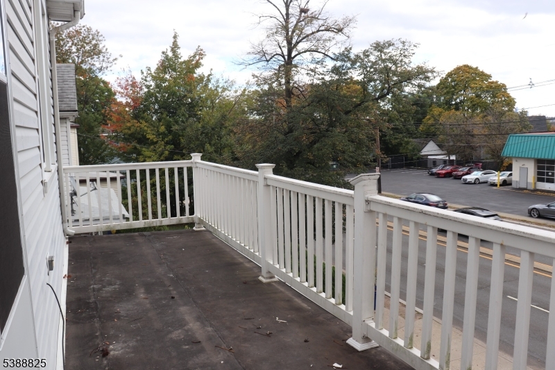 66 Winant Avenue Ridgefield Park, NJ 07660 - Photo 4 of 16 a view of a street with wooden fence