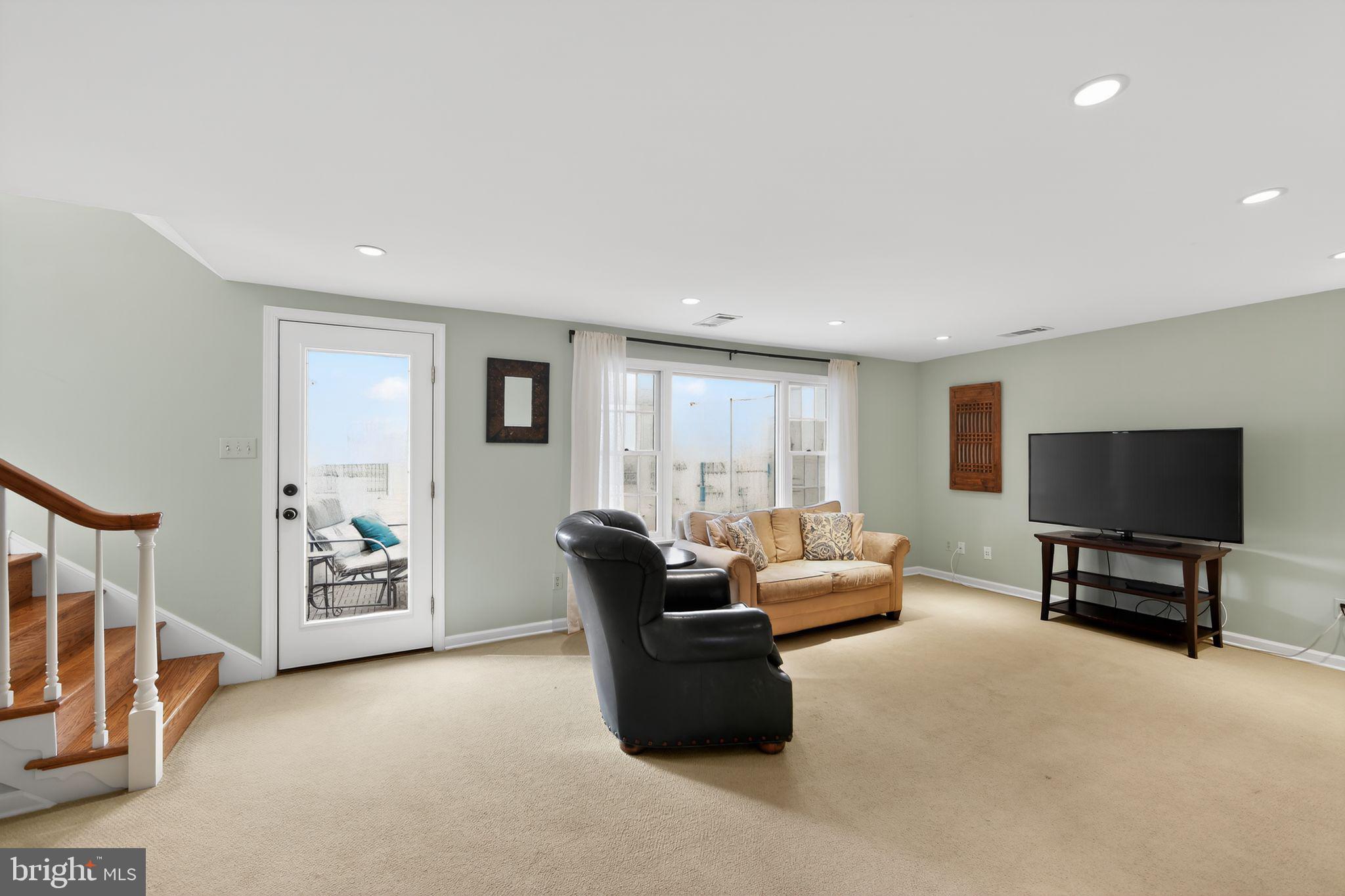 850 Farragut Road Berwyn, PA 19312 - Photo 18 of 37 Family Room with access to sunroom and rear yard