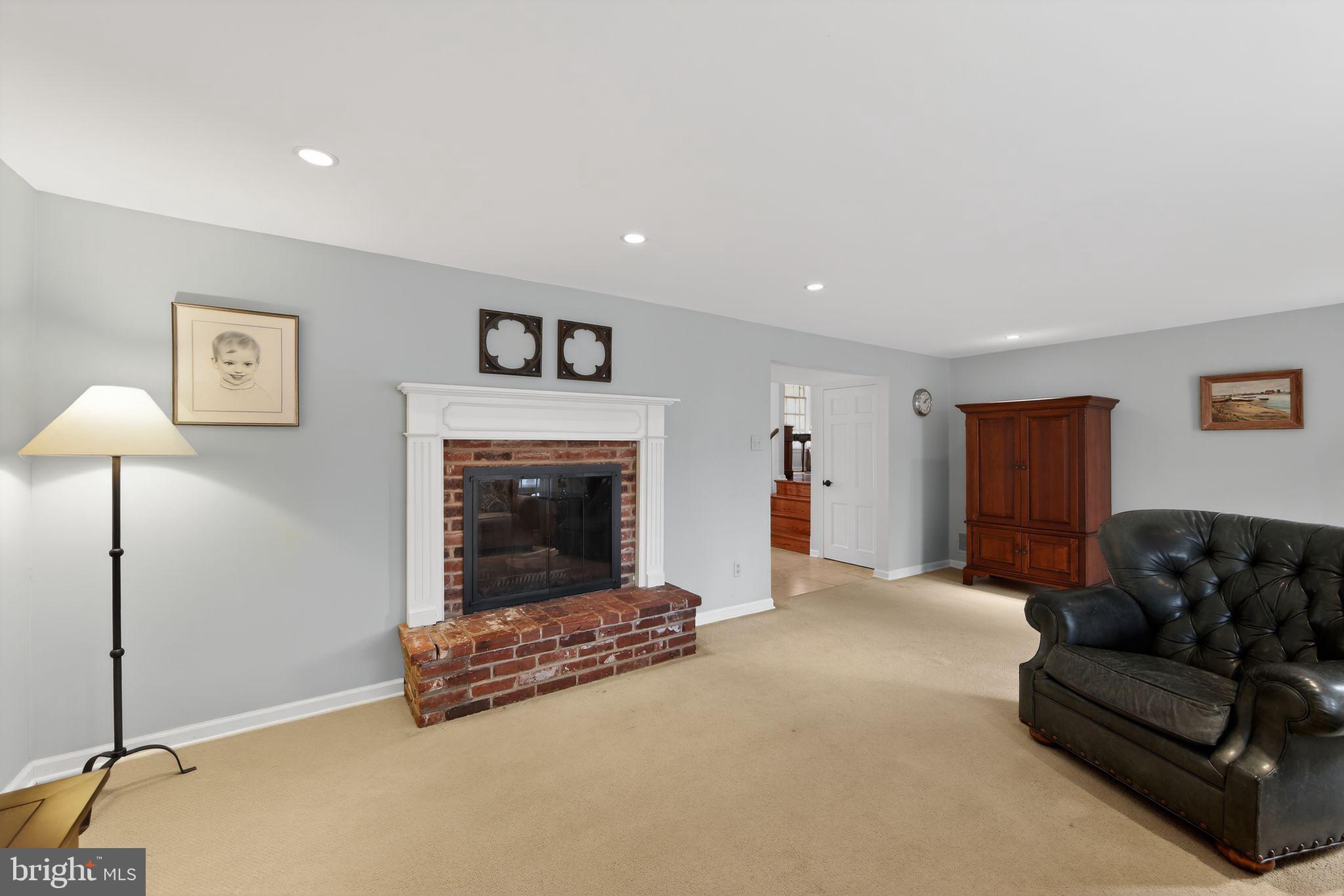 850 Farragut Road Berwyn, PA 19312 - Photo 20 of 37 Family Room Brick Wood Burning Fireplace