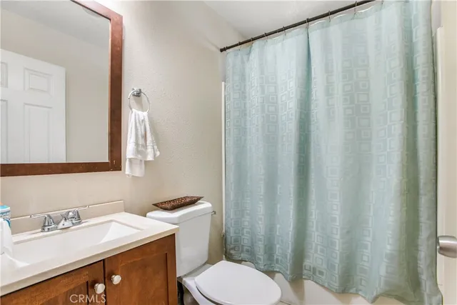 an empty room with white walls