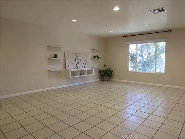 an empty room and window in a room