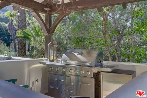 a living room with furniture or wooden floor and a lamp
