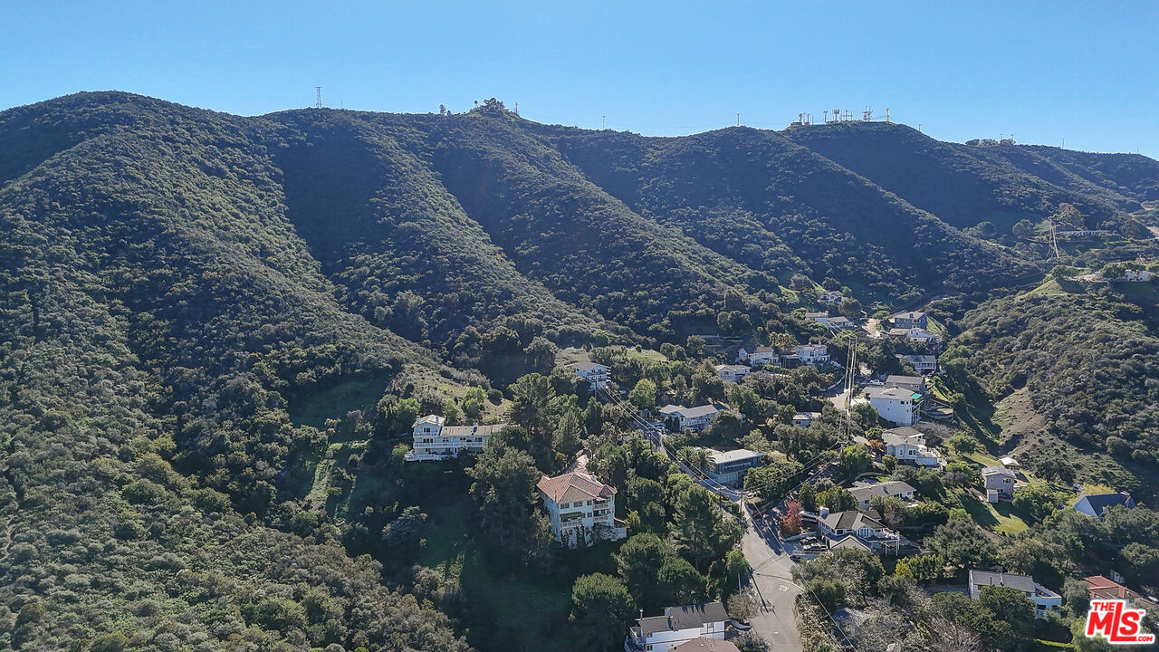 456 McKnight Road Newbury Park, CA 91320 - Photo 18 of 75 a view of a house with a mountain and a mountain view