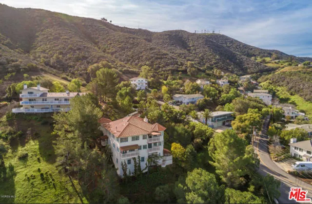 a view of a city with a building in the background
