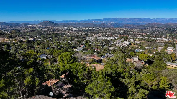 a workspace with furniture and a window