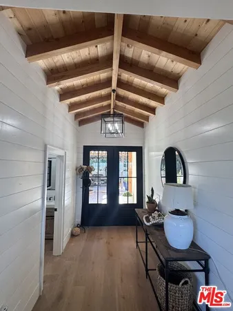 a bathroom with a sink double vanity and a shower
