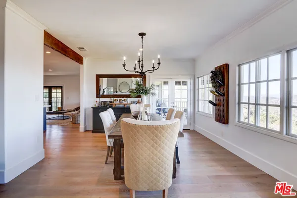 a kitchen with stainless steel appliances a sink stove top oven and cabinets
