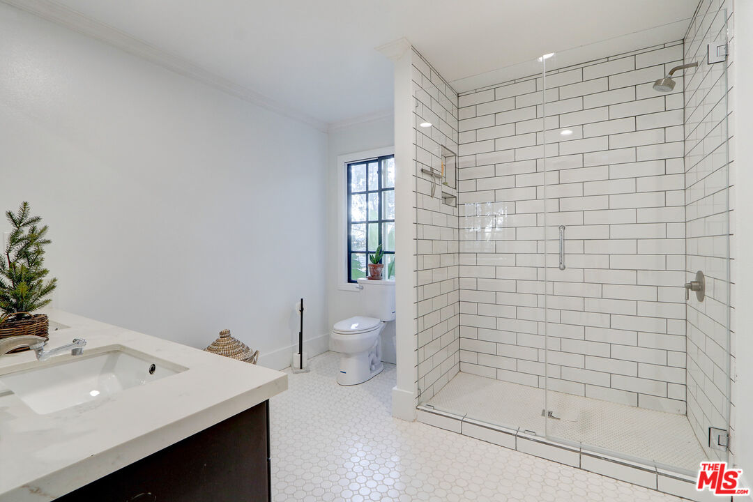 456 McKnight Road Newbury Park, CA 91320 - Photo 47 of 75 a bathroom with a shower and a sink