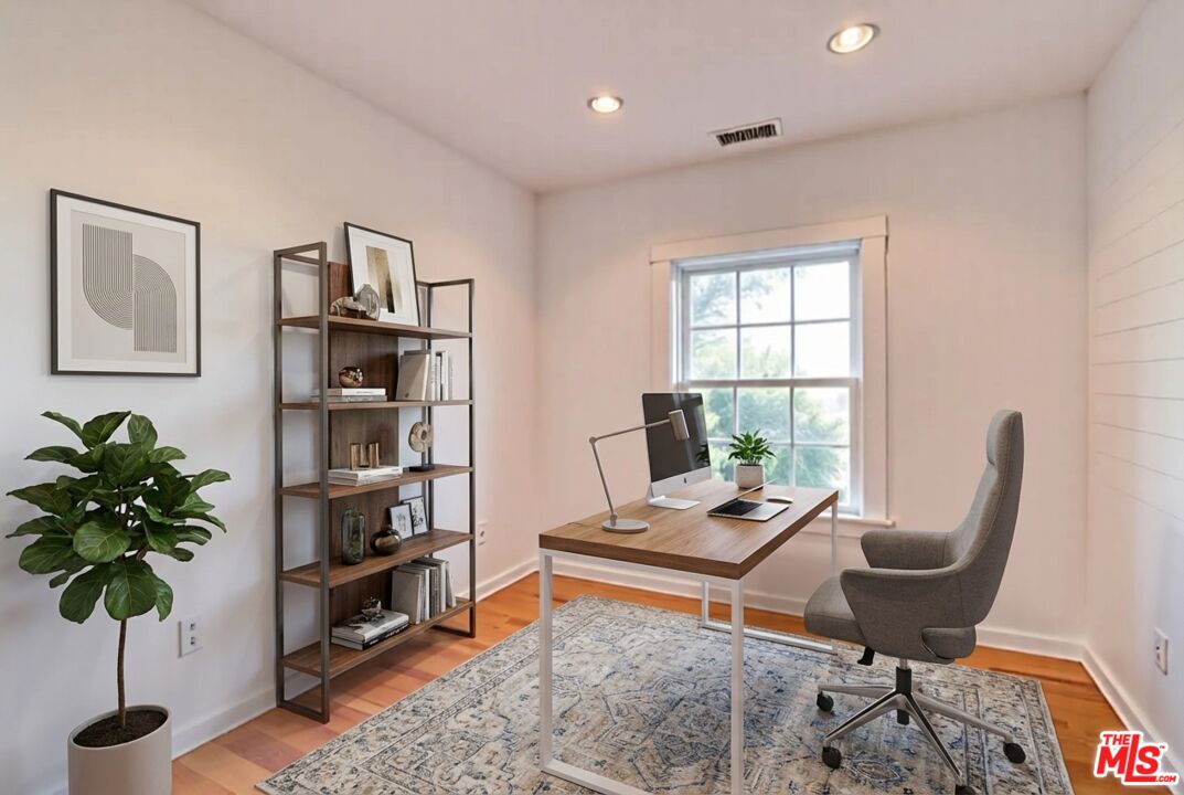 456 McKnight Road Newbury Park, CA 91320 - Photo 71 of 75 a living room with furniture potted plant and a window