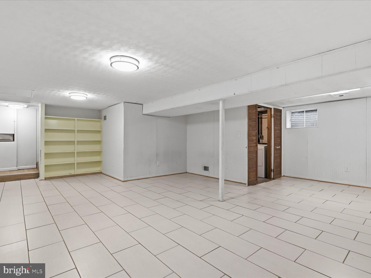 6818 Rolling Road Springfield, VA 22152 - Photo 19 of 31 Spacious, versatile basement retreat.