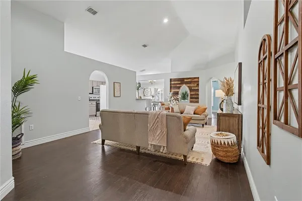 a living room with furniture and window