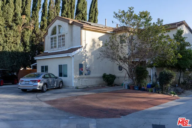 a car parked in front of a house