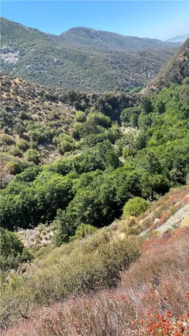 a view of a mountain with a outdoor space