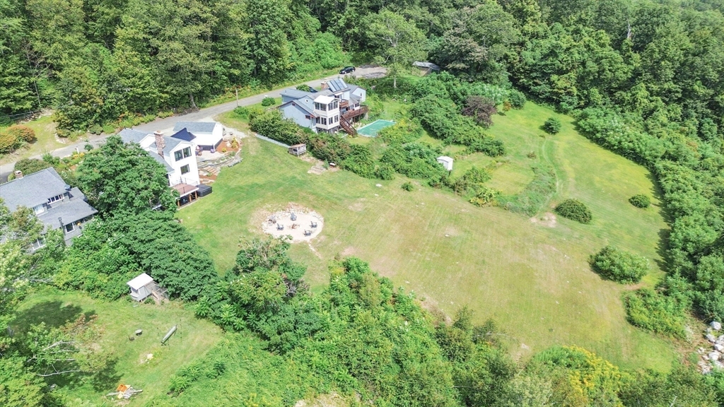 58 N Road Montgomery, MA 01085 - Photo 7 of 42 an aerial view of residential house with outdoor space and trees all around