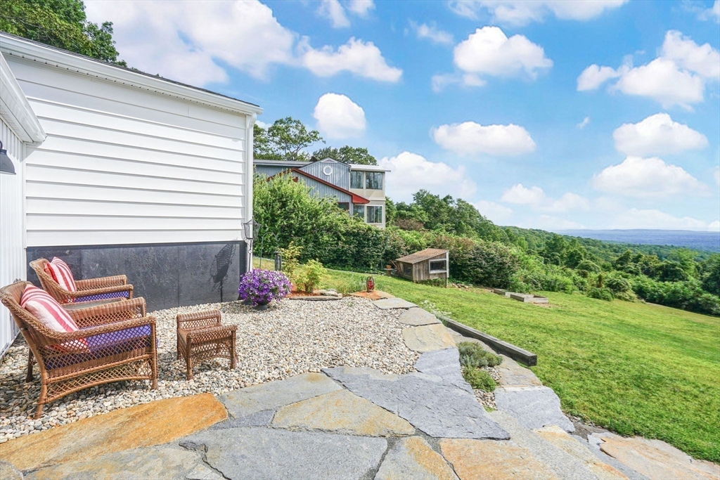 58 N Road Montgomery, MA 01085 - Photo 8 of 42 a view of a patio with a yard