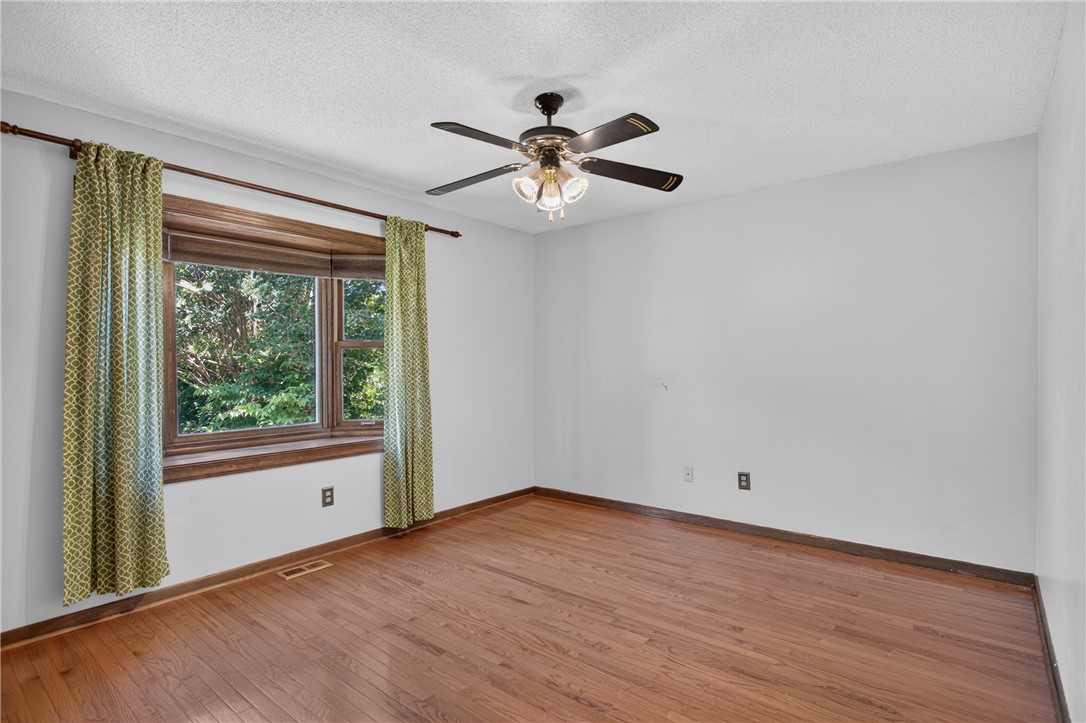 103 Dorsey Lane Walhalla, SC 29691 - Photo 22 of 42 Hardwood floors and a bay window create an inviting atmosphere.