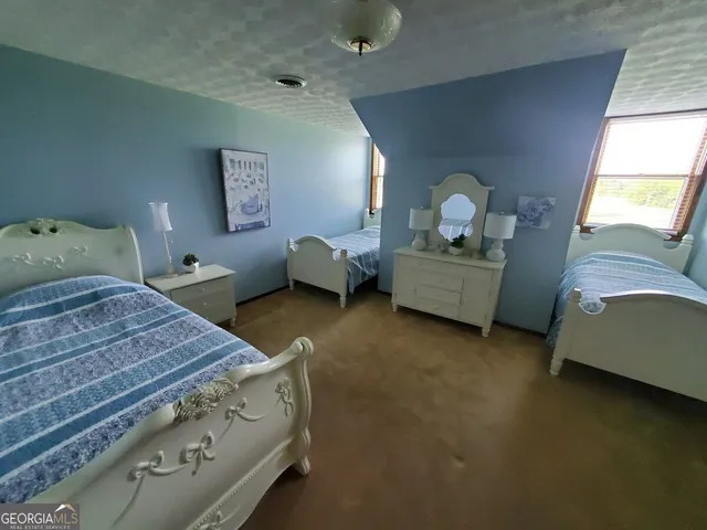 a view of a porch with furniture